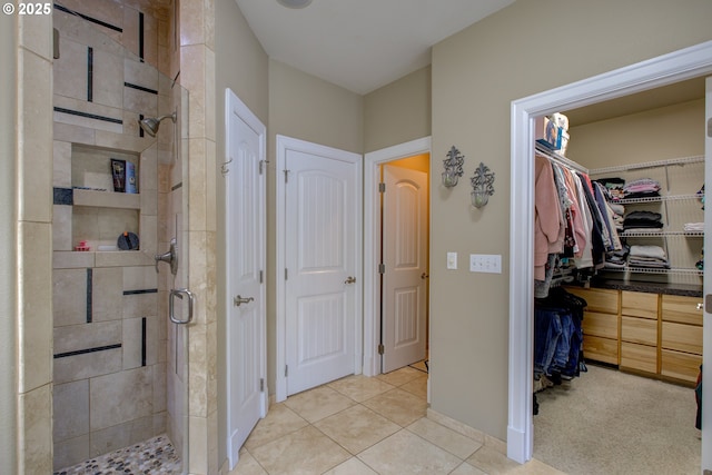 459 Oak Valley Loop, Winchester, OR 97495 - full bathroom with a shower stall, tile patterned floors, and a spacious closet