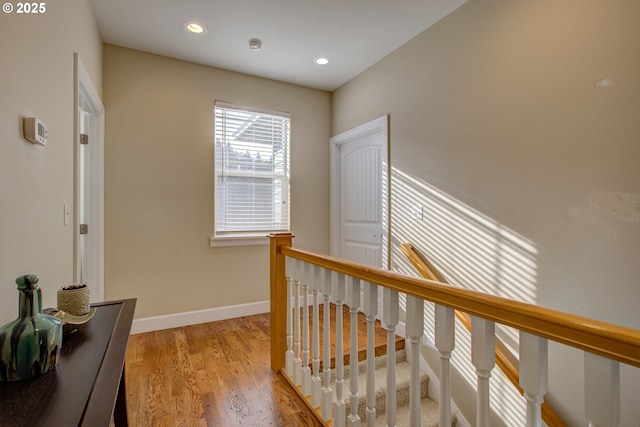 459 Oak Valley Loop, Winchester, OR 97495 - hallway featuring light wood-type flooring, recessed lighting, and an upstairs landing