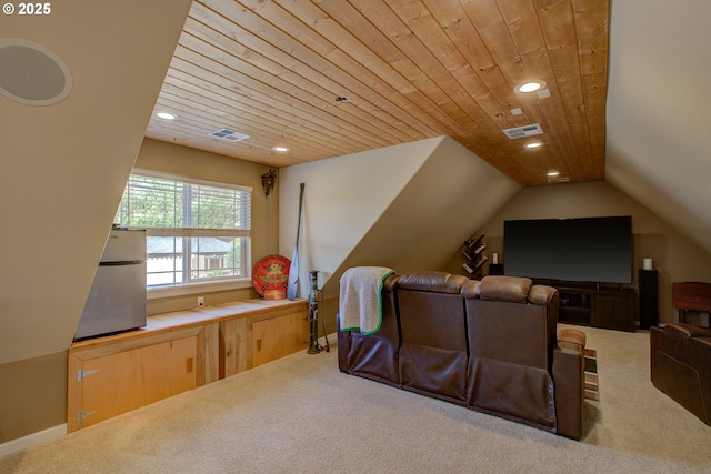 home theater with wood ceiling, carpet flooring, and a wealth of natural light