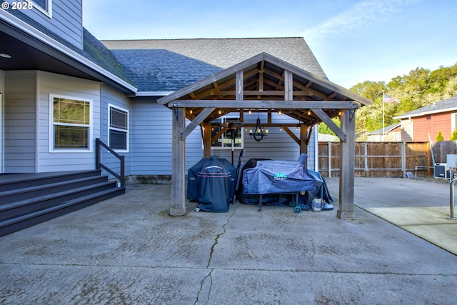 view of swimming pool with a patio, a yard, and a gazebo