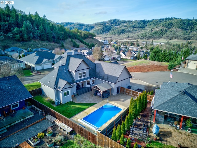 459 Oak Valley Loop, Winchester, OR 97495 - aerial view of residential area featuring a pool area