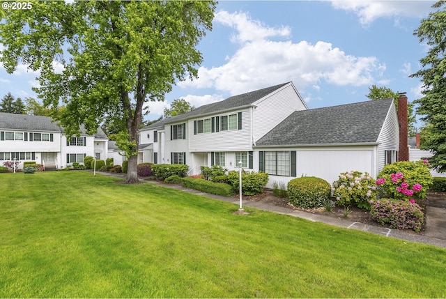 6125 SW Erickson Ave, Beaverton, OR 97008 - view of front facade with a chimney, a front lawn, and roof with shingles
