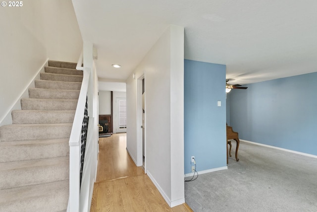 6125 SW Erickson Ave, Beaverton, OR 97008 - stairs with a ceiling fan, baseboards, recessed lighting, and wood finished floors