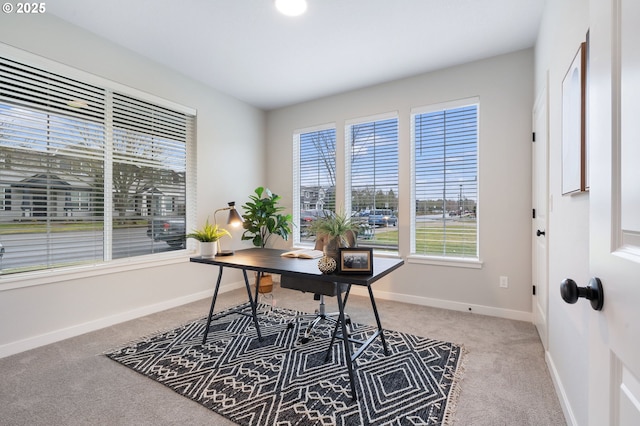 view of carpeted office space