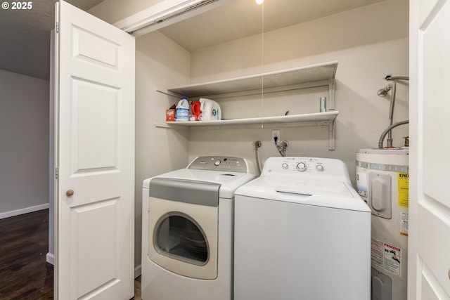 washroom with dark hardwood / wood-style floors, independent washer and dryer, and water heater