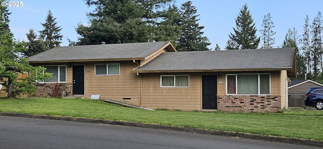 view of front facade featuring a front yard