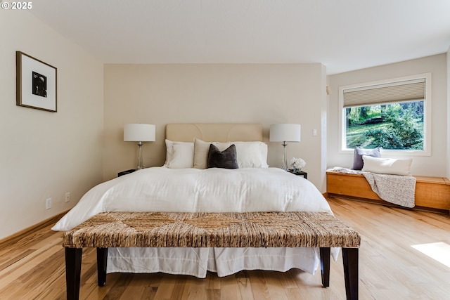 bedroom featuring light wood finished floors