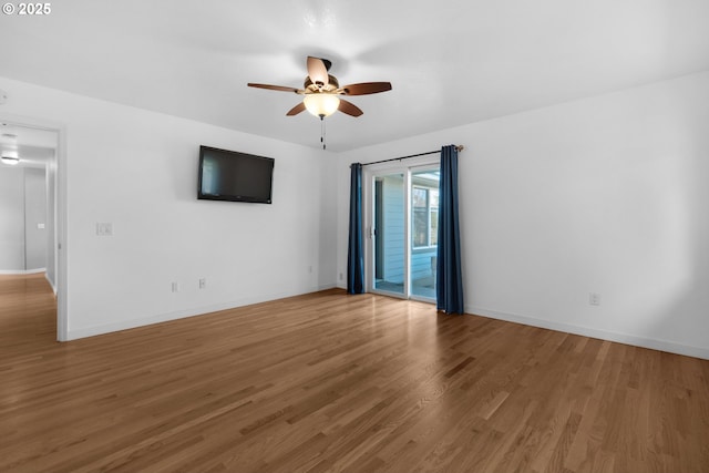 89523 Manion Dr, Warrenton, OR 97146 - unfurnished room featuring a ceiling fan and wood finished floors