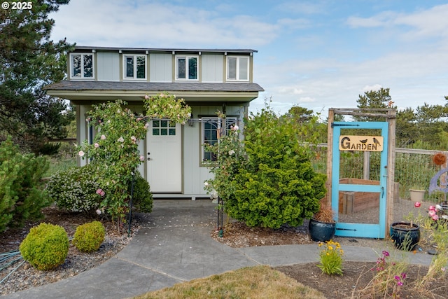 89523 Manion Dr, Warrenton, OR 97146 - view of front facade with board and batten siding