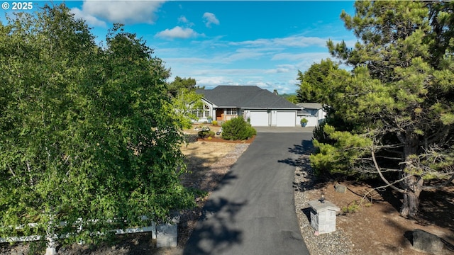 89523 Manion Dr, Warrenton, OR 97146 - view of front of house with driveway and a garage