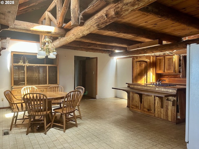 29202 Wallace St, Gold Beach, OR 97444 - dining area featuring wooden ceiling, visible vents, and beam ceiling