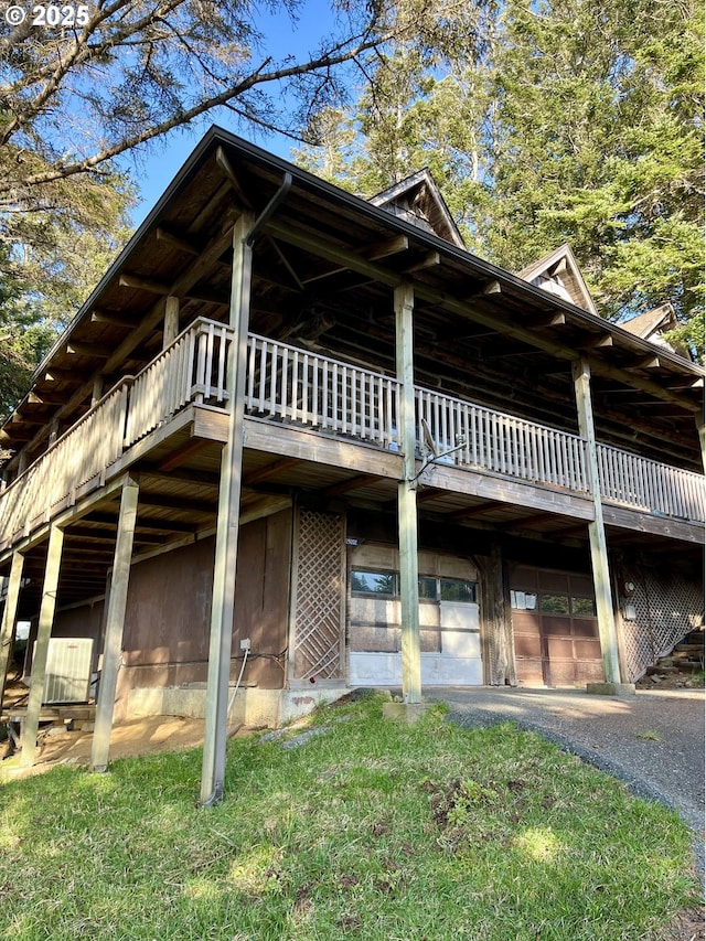 29202 Wallace St, Gold Beach, OR 97444 - view of property exterior with a garage and driveway
