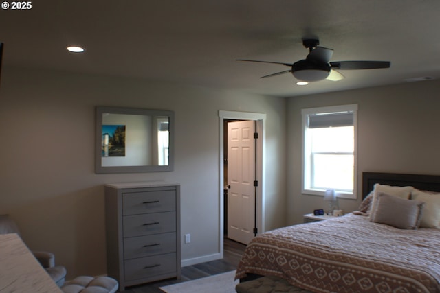 bedroom with ceiling fan, dark wood-style flooring, baseboards, and recessed lighting