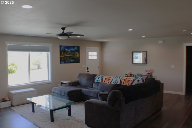living room with recessed lighting, ceiling fan, baseboards, and wood finished floors