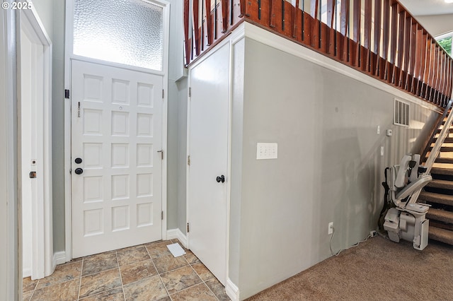 1354 Mulligan Ct, Salem, OR 97306 - foyer entrance with baseboards, stairway, and light stone finish flooring