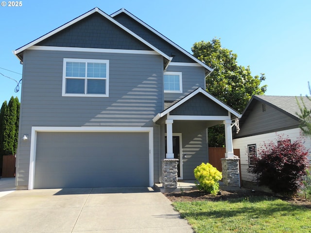 439 NW Garibaldi St, Hillsboro, OR 97124 - craftsman-style house featuring an attached garage, covered porch, and concrete driveway