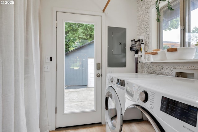 9014 N John Ave, Portland, OR 97203 - laundry room with electric panel and washer and clothes dryer