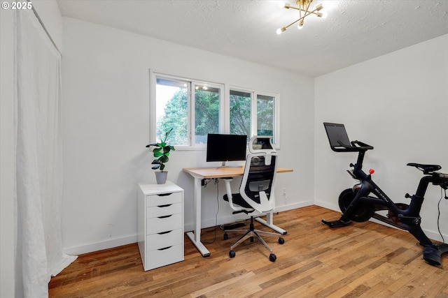9014 N John Ave, Portland, OR 97203 - home office featuring light wood-type flooring and baseboards