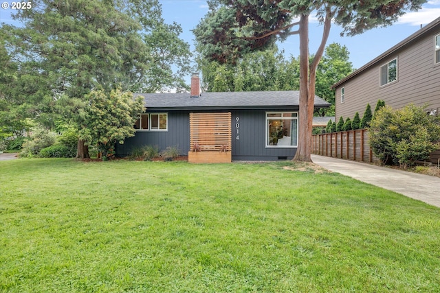 9014 N John Ave, Portland, OR 97203 - view of front facade with a chimney and roof with shingles