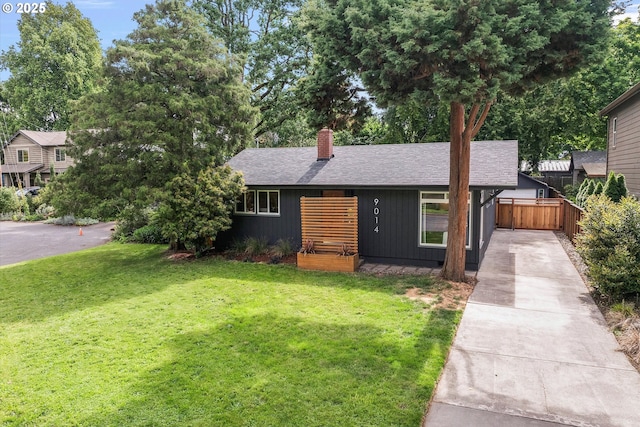 9014 N John Ave, Portland, OR 97203 - view of front of property with driveway, a chimney, and roof with shingles
