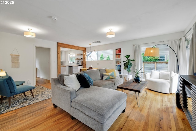 9014 N John Ave, Portland, OR 97203 - living room featuring light wood-style flooring