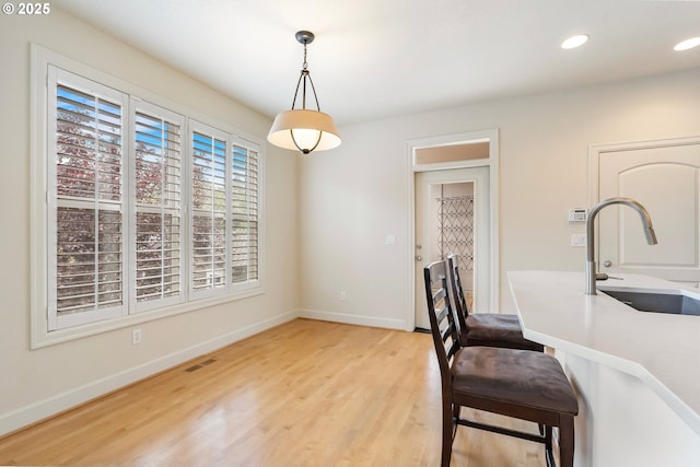 2435 NW Burnett St, Portland, OR 97229 - dining space featuring light wood-style floors and recessed lighting