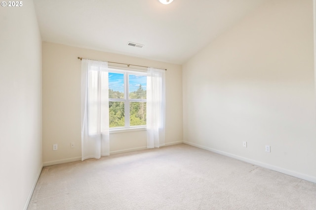 2435 NW Burnett St, Portland, OR 97229 - spare room featuring carpet flooring and vaulted ceiling