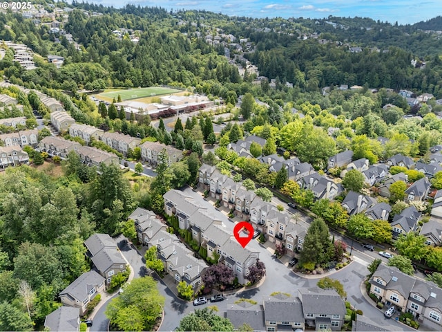 2435 NW Burnett St, Portland, OR 97229 - aerial view of residential area with a forest