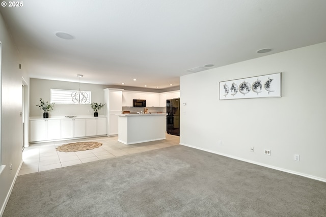 555 NE Caden Ave, Hillsboro, OR 97124 - unfurnished living room with light colored carpet, recessed lighting, light tile patterned floors, and baseboards