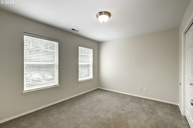 555 NE Caden Ave, Hillsboro, OR 97124 - unfurnished room featuring carpet and baseboards
