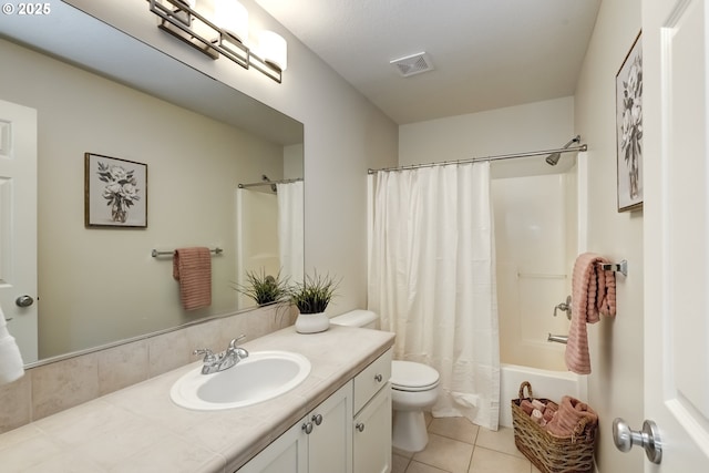 555 NE Caden Ave, Hillsboro, OR 97124 - full bath with vanity, toilet, tile patterned flooring, and shower / bath combo