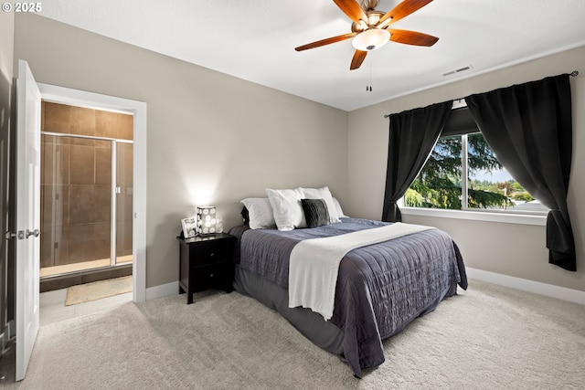 7886 SW Capitol Hill Rd, Portland, OR 97219 - bedroom with carpet floors, ensuite bathroom, and a ceiling fan