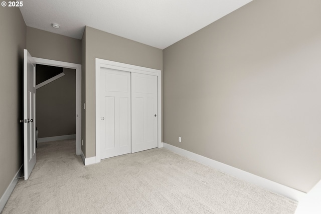 7886 SW Capitol Hill Rd, Portland, OR 97219 - unfurnished bedroom with light carpet and a closet