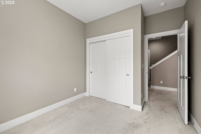 7886 SW Capitol Hill Rd, Portland, OR 97219 - unfurnished bedroom with light colored carpet and a closet