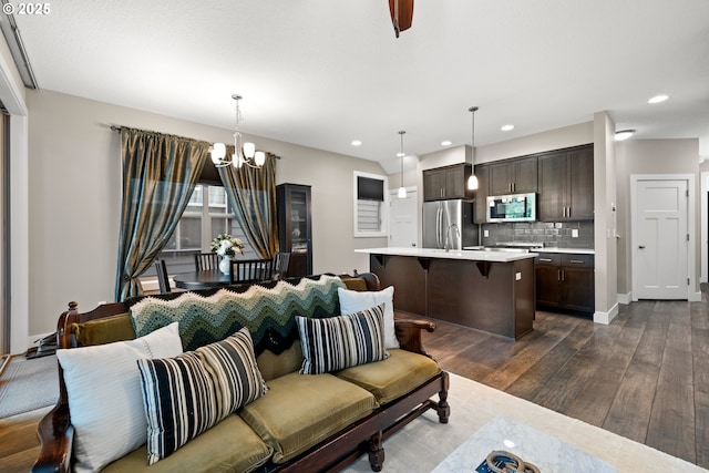 7886 SW Capitol Hill Rd, Portland, OR 97219 - living area featuring a chandelier, dark wood finished floors, and recessed lighting