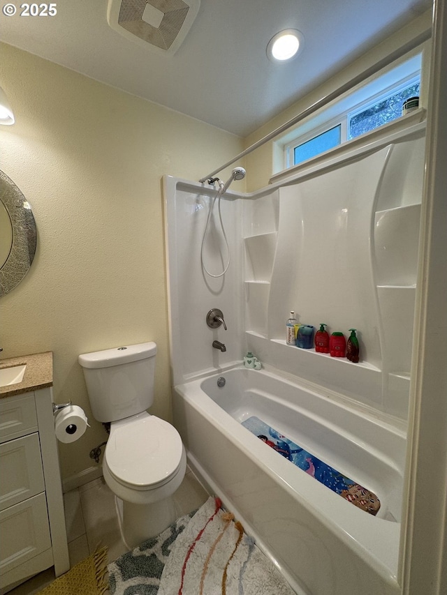 full bathroom featuring shower / bathing tub combination, visible vents, tile patterned flooring, vanity, and toilet