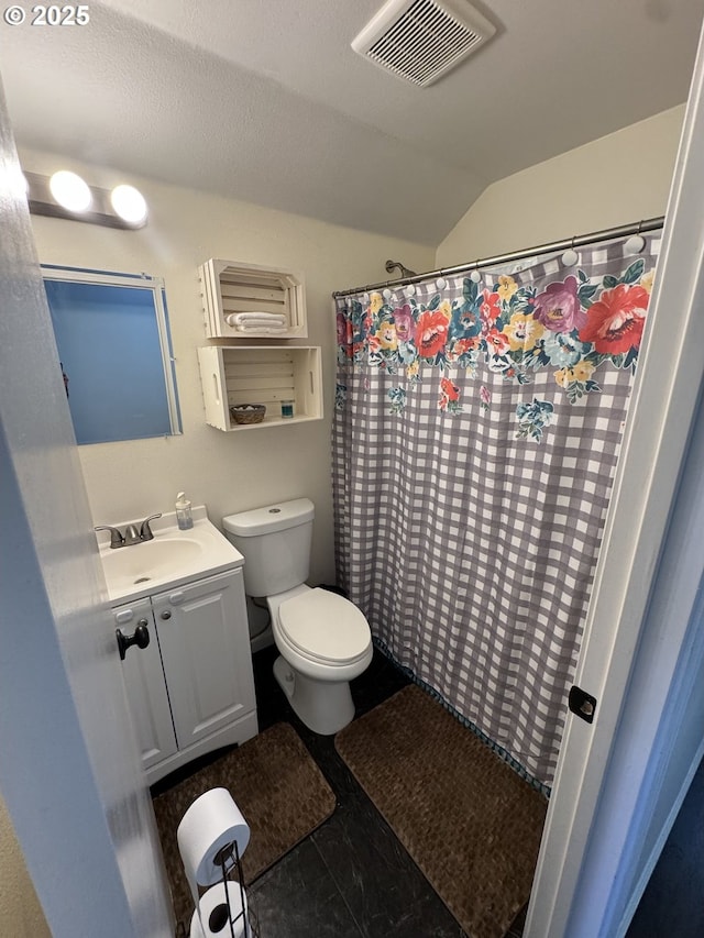 full bathroom featuring visible vents, vanity, curtained shower, toilet, and vaulted ceiling