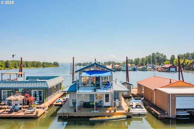 18989 NE Marine Dr Unit 04, Portland, OR 97230 - dock with a water view and a balcony