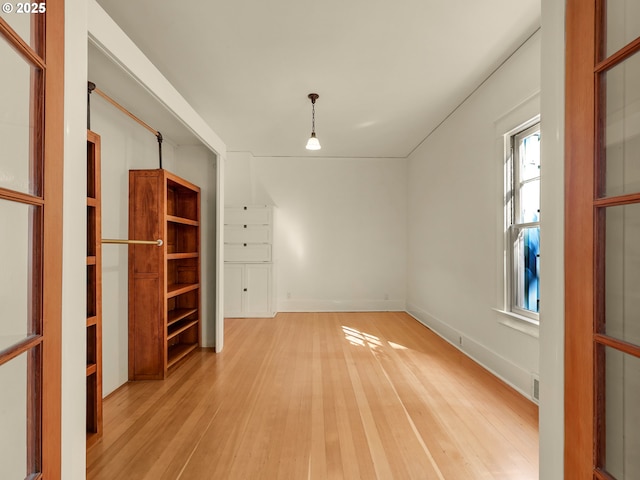 1925 Irving Ave, Astoria, OR 97103 - empty room with light wood-type flooring and baseboards