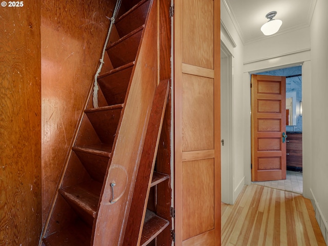 1925 Irving Ave, Astoria, OR 97103 - stairway featuring crown molding and wood finished floors
