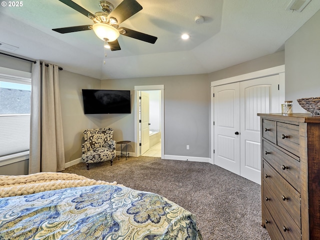 bedroom with visible vents, carpet flooring, ensuite bathroom, and a closet