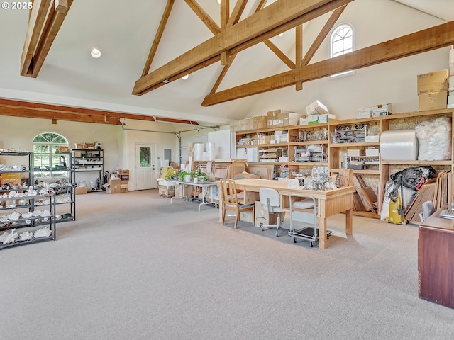 interior space with high vaulted ceiling and beamed ceiling