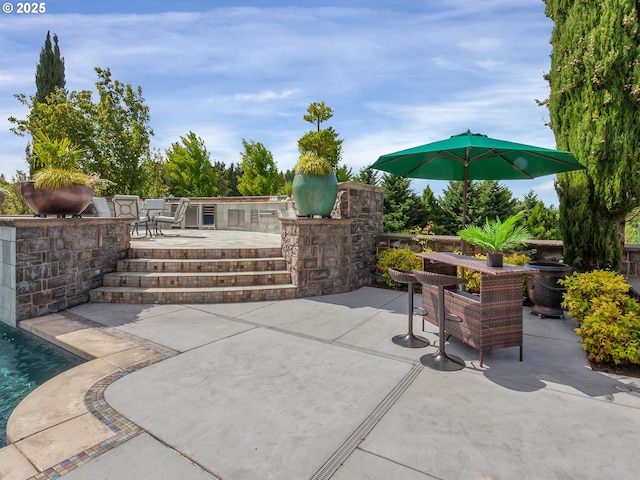 view of patio / terrace featuring exterior kitchen