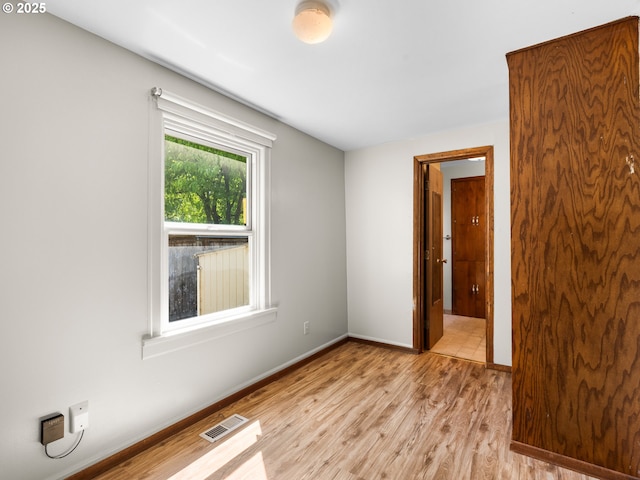3128 SE 64th Ave, Portland, OR 97206 - unfurnished room with light wood-style floors and baseboards