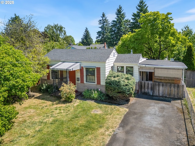 3128 SE 64th Ave, Portland, OR 97206 - view of front of home with brick siding, roof with shingles, and asphalt driveway