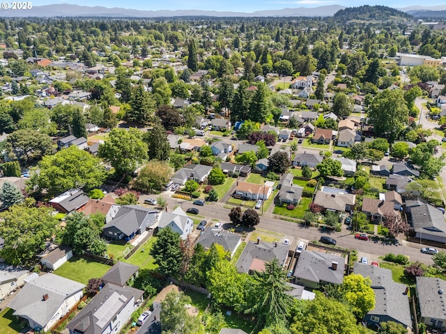 3128 SE 64th Ave, Portland, OR 97206 - aerial perspective of suburban area with a mountain backdrop