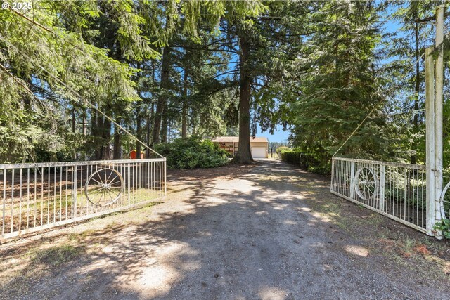15170 SE 202nd Ave, Damascus, OR 97089 - view of dirt / gravel driveway with a gated entry
