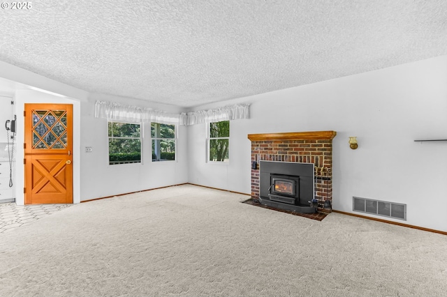 15170 SE 202nd Ave, Damascus, OR 97089 - unfurnished living room with a textured ceiling and carpet floors