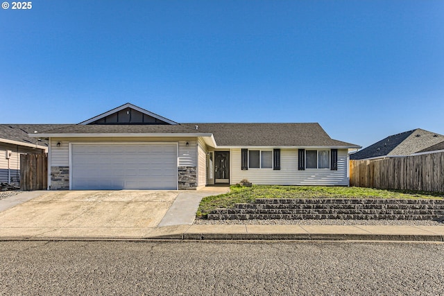 ranch-style home featuring a garage