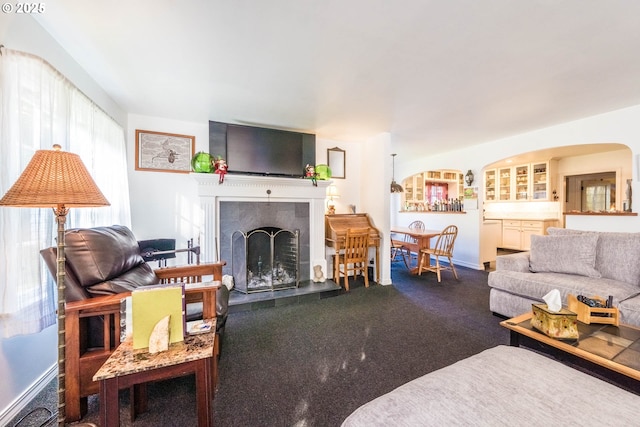 1756 NW 35th Pl, Lincoln City, OR 97367 - living room featuring dark carpet and a tile fireplace